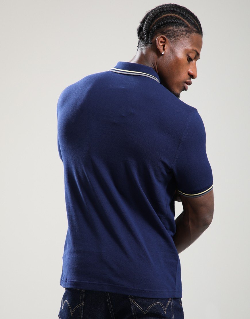 Fred Perry Twin Tipped Polo Shirt French Navy/Champion Gold/Stockport Blue Fred Perry Twin Tipped Polo Shirt French Navy/Champion Gold/Stockport Blue