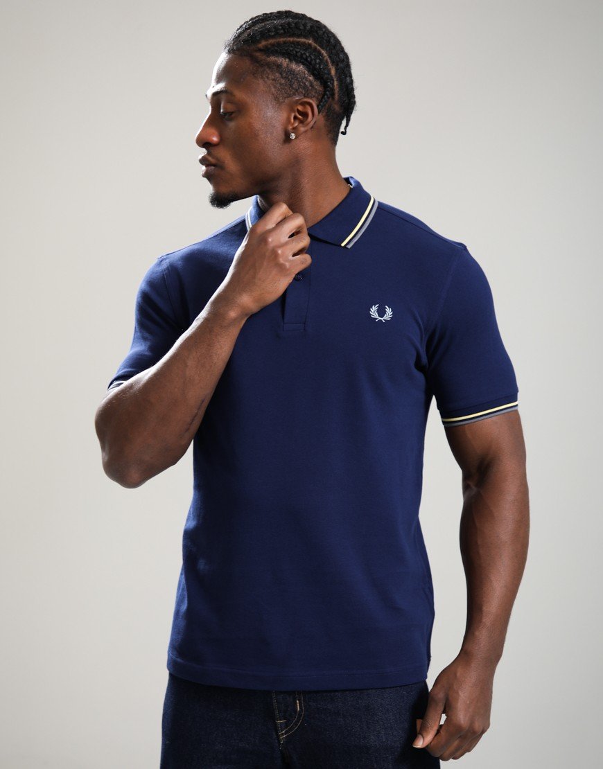 Fred Perry Twin Tipped Polo Shirt French Navy/Champion Gold/Stockport Blue Fred Perry Twin Tipped Polo Shirt French Navy/Champion Gold/Stockport Blue