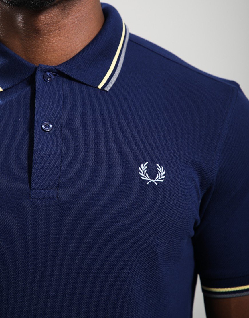 Fred Perry Twin Tipped Polo Shirt French Navy/Champion Gold/Stockport Blue Fred Perry Twin Tipped Polo Shirt French Navy/Champion Gold/Stockport Blue