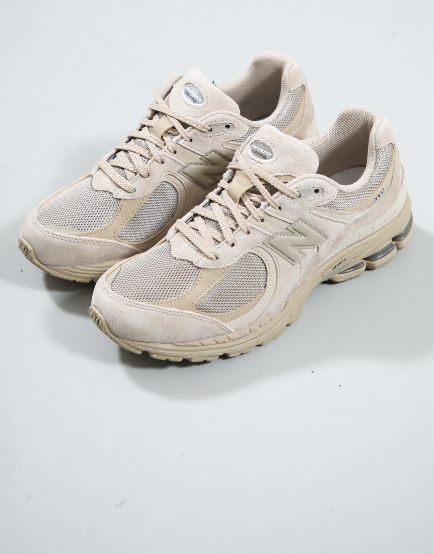 New Balance U2002RV1 Trainers Stoneware/Silver Metallic