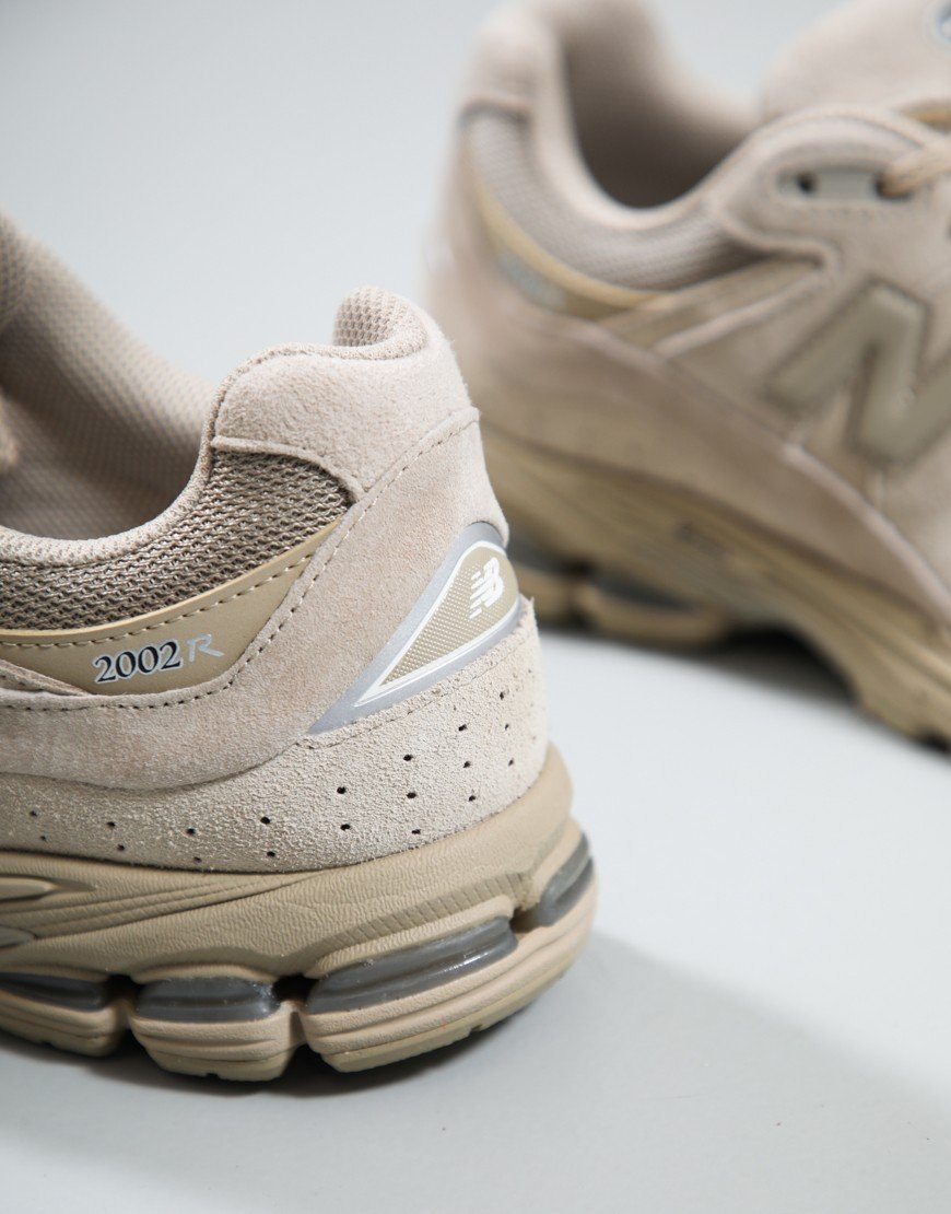 New Balance U2002RV1 Trainers Stoneware/Silver Metallic